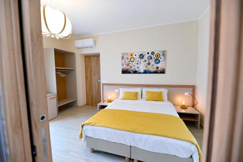 Lova arba lovos apgyvendinimo įstaigoje Gioie B&B