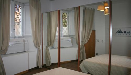 Voodi või voodid majutusasutuse Sforza Apartment toas