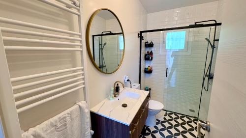 a bathroom with a sink and a mirror at Villa Lloret De Mar in Lloret de Mar