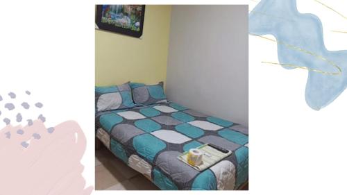 two pictures of a bedroom with a bed in it at Hotel Valparaiso in San Antonio
