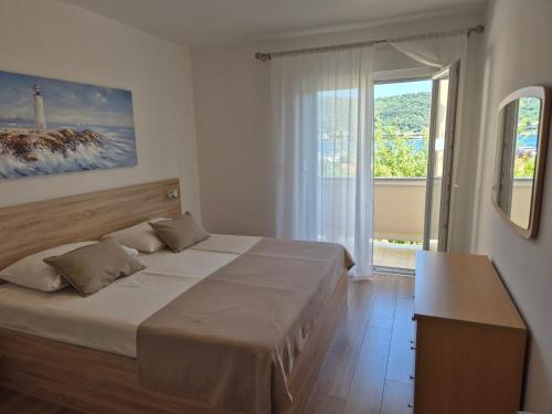 Apartments with parking space Supetarska Draga - Donja, Rab - 25344