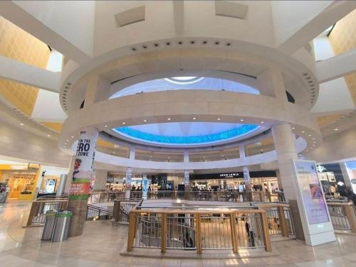 a large shopping mall with a large ceiling at Luxury 2 bed house in Dartford, United Kingdom in Dartford