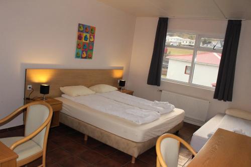 Postel nebo postele na pokoji v ubytování North Star Hotel Olafsvik