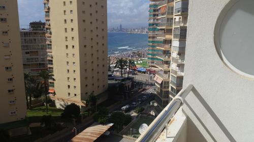a view of the ocean from the balcony of a building at Mont-Park in Benidorm