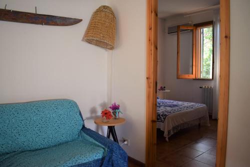 A bed or beds in a room at Casa Bedda