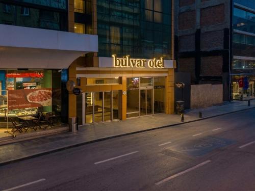 a building with a sign that reads bulvar old at Bulvar Hotel in İzmir
