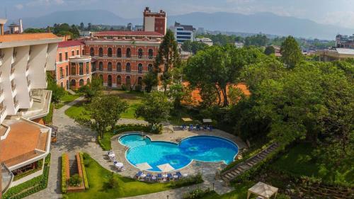 an overhead view of a courtyard with two swimming pools at Hotel Yak & Yeti in Kathmandu