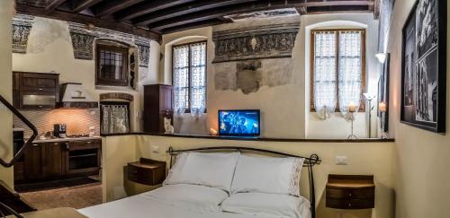 En eller flere senger på et rom på Residence Casanova Duomo
