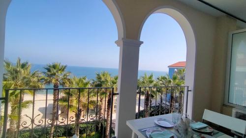 a balcony with a view of the beach at Monolocale DIRETTAMENTE SUL MARE cod 509 in Porto Recanati