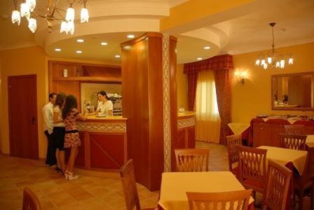 a group of people standing in a restaurant at Hotel Duca Di Calabria in Serra San Bruno
