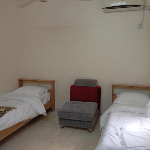 Un pat sau paturi într-o cameră la Apartment 5 area