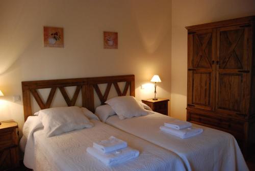 Lova arba lovos apgyvendinimo įstaigoje Casa rural las Navillas