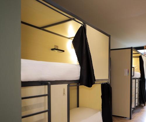 a pair of bunk beds in a room at Revolver Edinburgh in Edinburgh