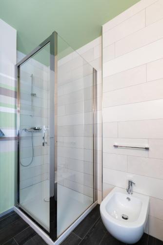 a bathroom with a shower and a sink at Casa Monet 41 in Saint Vincent