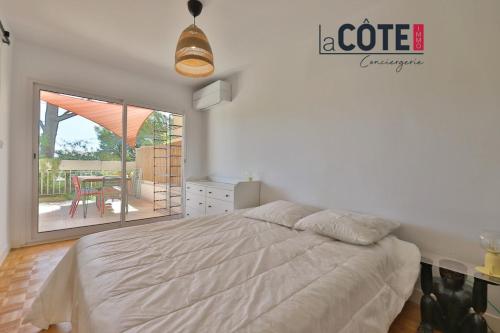 Llit o llits en una habitació de Le Cigalon