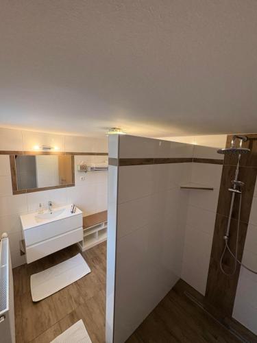 a bathroom with a sink and a shower at Gästezimmer Schupanez in Leutschach