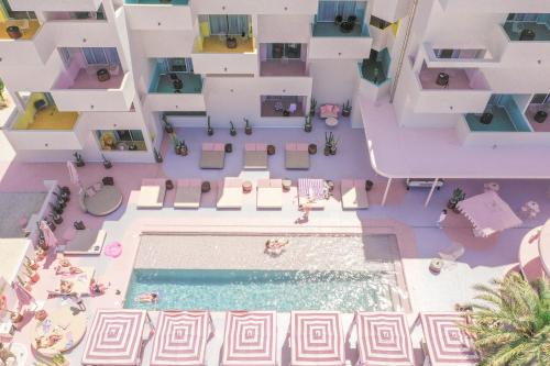 an overhead view of a swimming pool in a building at Paradiso Ibiza Art Hotel - Adults Only in San Antonio Bay