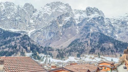 a mountain view of a town in front of a city at Casa Loca Colere in Colere