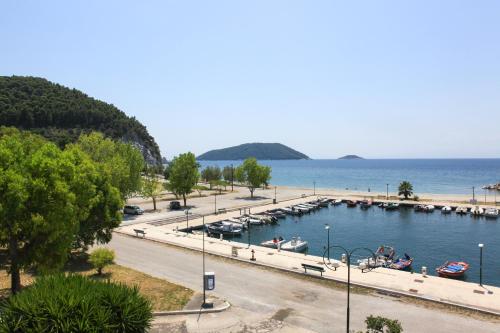 a large body of water with boats in it at Lina`s Apartment & Maisonette in Neo Klima