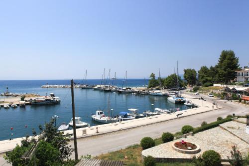 a view of a marina with boats in the water at Lina`s Apartment & Maisonette in Neo Klima