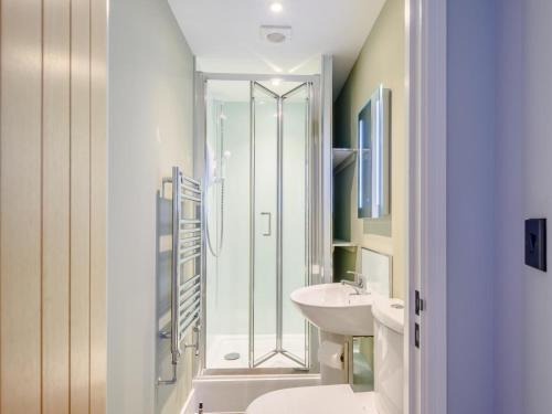 a bathroom with a shower and a sink at 3 Bed in Bideford oc-78796 in Northam