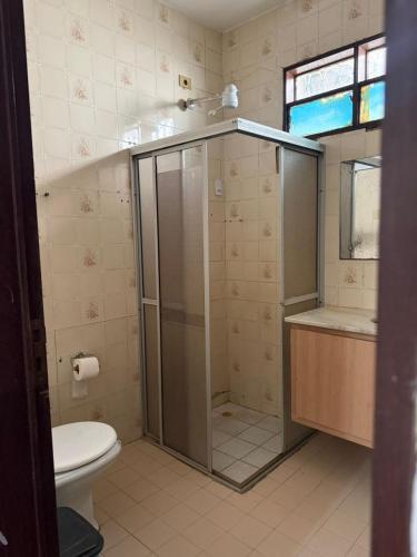 a bathroom with a shower and a toilet at Jampa Pousada Sb in João Pessoa
