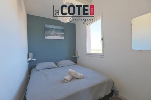 Llit o llits en una habitació de Les Embruns