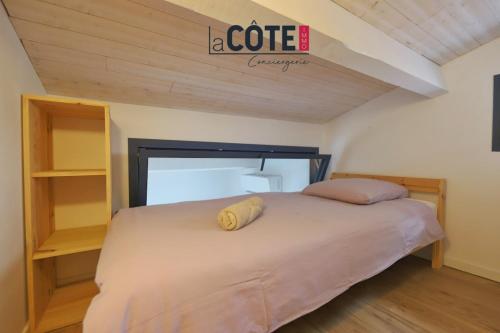 Llit o llits en una habitació de Le Chapon
