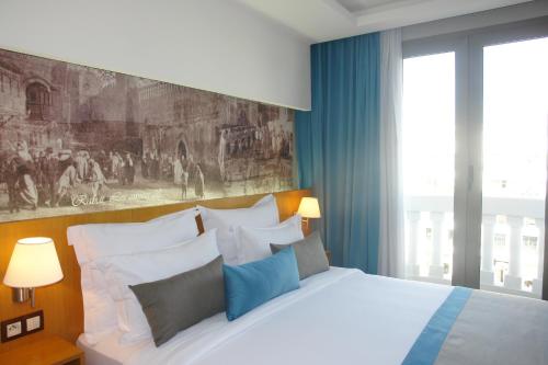 Кровать или кровати в номере ONOMO Hotel Rabat Terminus