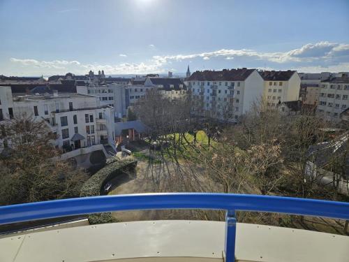 a view of a city from a balcony at La maison de Pommard in Dijon