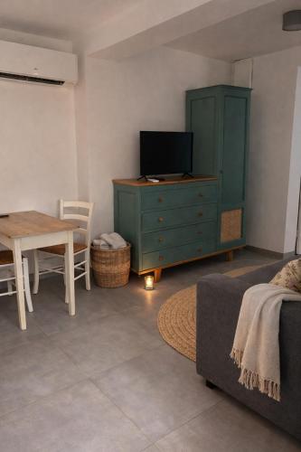 TV a/nebo společenská místnost v ubytování Maison Thany 2