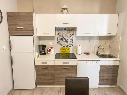 Apartment Partial sea & city view by Interhome