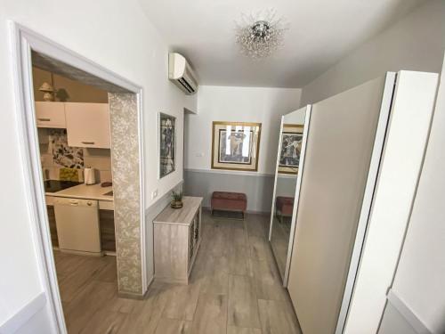 Apartment Partial sea & city view by Interhome