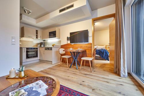Foto Bader Suites - Apartments 5