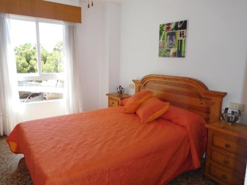 En eller flere senge i et værelse på Precious Apartment in Alicante, Playa San Juan