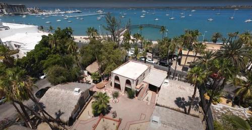 an aerial view of a house next to a beach at Sandy Shores Cabaña 7 in La Paz