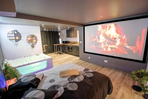 Suite de luxe Balnéo et Cinéma Le Saona
