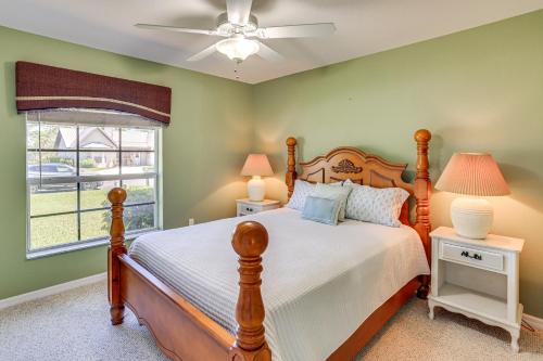 a bedroom with a bed and a window at Saltwater Pool! Sebring Oasis Near Lake Jackson in Sebring