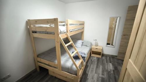 a couple of bunk beds in a room at Casa Patio Zamora in Zamora