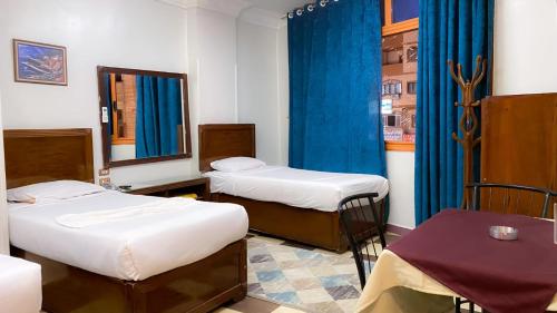 Ліжко або ліжка в номері Dream Hotel