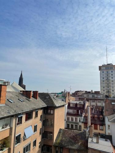 a view of a city skyline with buildings at HYPER CENTRE - 2 STUDIOS - 2min PLACE KLEBER in Strasbourg