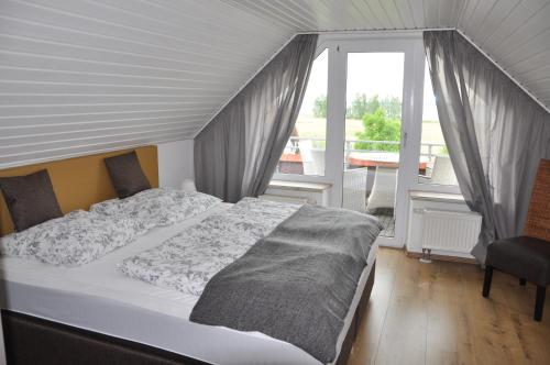 Postel nebo postele na pokoji v ubytování Landhaus Sandra