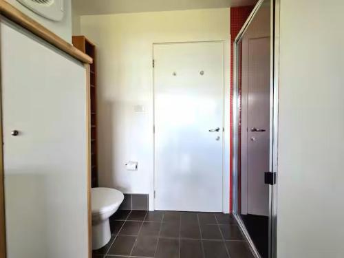 a bathroom with a toilet and a sink at Narrow Neck Views - Peaceful 4 Bedroom Home with Stunning Views! in Katoomba