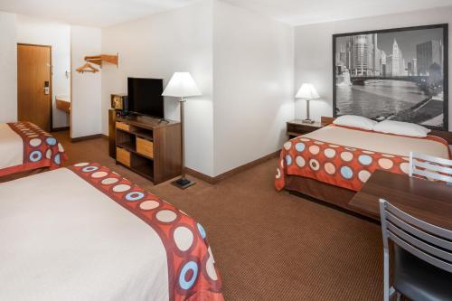 Super 8 by Wyndham Pekin/Peoria Areaにあるベッド