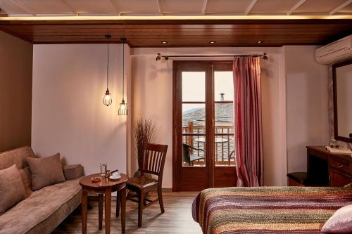 Postel nebo postele na pokoji v ubytování Hotel Dryades and Spa