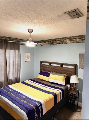 a bedroom with a bed in a room at Island 1 in Kissimmee