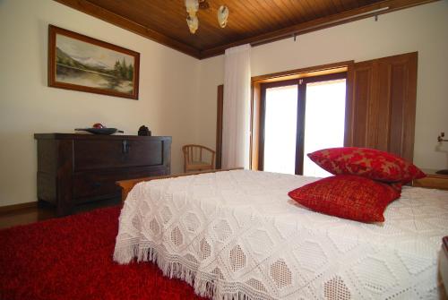Postel nebo postele na pokoji v ubytování Quinta do Alto
