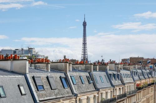 Luxe sous les toits de Paris avec vue Tour Eiffel