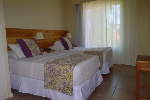 Postel nebo postele na pokoji v ubytování Joan Miró Hotel