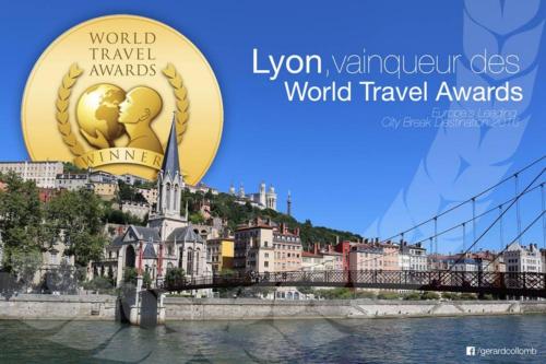 a banner for the world travel awards with a bridge at L'Appart Elegance Part Dieu in Lyon